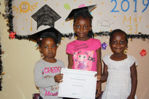 Group of girls with their certificate of completion
